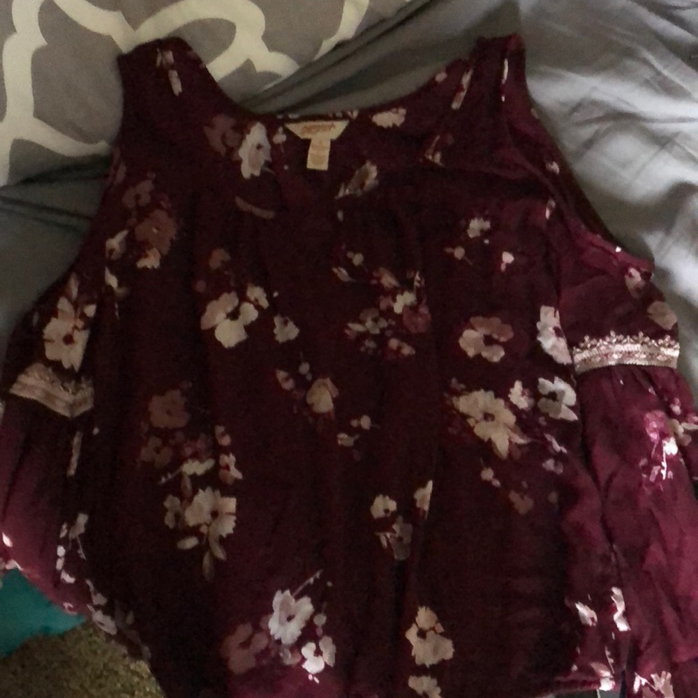 It’s summer shirt with flowers arms a little out